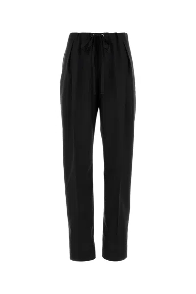Khaite Cessie Pleated High-waisted Trousers In Black