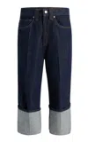 Khaite Boyle Cuffed Rigid Capri Jeans In Blue