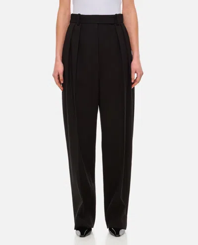 Khaite Cessie Pleated Crepe Tailored Trousers In Black