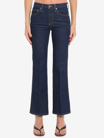 Khaite Clara Mid-rise Flared-leg Jeans In Blue