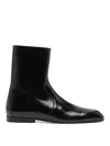 Khaite Glossy Enameled Leather Boot In Black