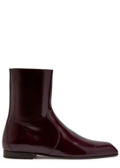 KHAITE KHAITE COLT GLOSSED LEATHER ANKLE BOOTS