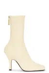 Khaite 100mm Eva Leather Mid Calf Boots In Neutral
