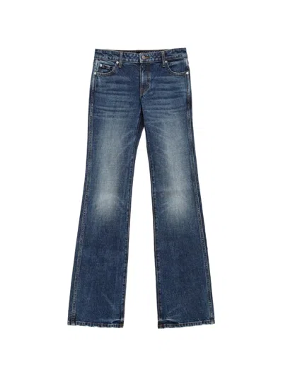 Khaite Faded Flared Jeans In Blue