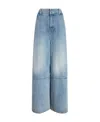 Khaite Isla Paneled High-rise Wide-leg Jeans In Blue