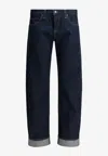 Khaite Karo Mid-rise Barrel-leg Jeans In Blue