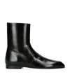 Khaite Glossy Enameled Leather Boot In Black