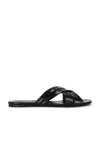 Khaite Liria Glossed-leather Sandals In Black