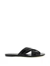Khaite Liria Glossed-leather Sandals In Black