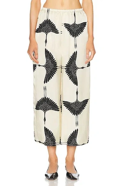 Khaite Mindy Cropped Cupro Wide-leg Pants In Cream Black