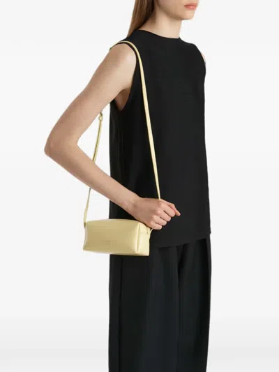 Khaite Mini Kye Crossbody Bag In Pale-yellow Crackle-patent Leather