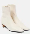 Khaite 40mm Nevada Stretch Ankle Boots In Off White