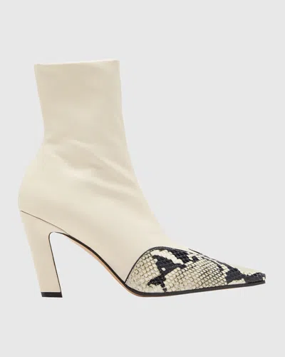 Khaite Nevada Stretch Leather Ankle Boots In Bone Natural