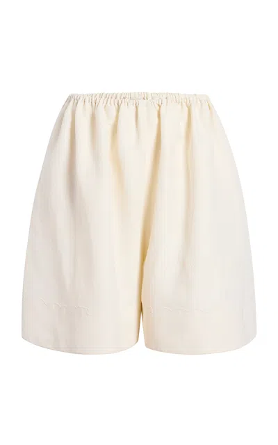 Khaite Nilmette Embroidered Linen-blend Shorts In Orange