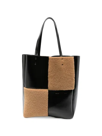 Khaite Patchwork Shearling-panel Tote Bag In Black