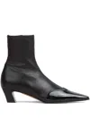 Khaite Patent Leather Boots In Black