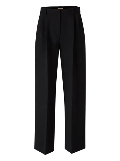 Khaite Pleated High-waisted Trousers In Black