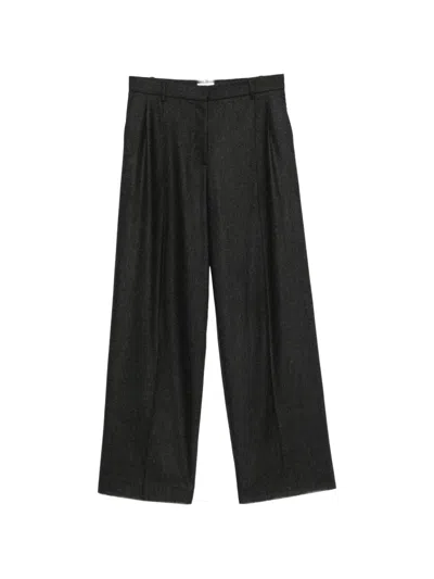 Khaite Pleated Wide-leg Trousers In Black