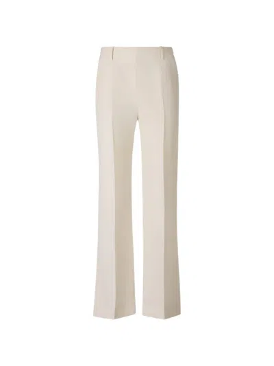 Khaite Pressed-crease Slit-hem Trousers In White