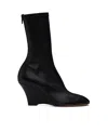 Khaite Rear Zipper Boot In Black
