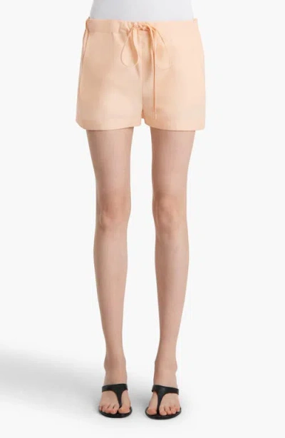 Khaite Robbie Cotton-poplin Shorts In Orange