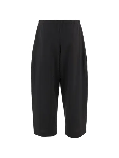 Khaite Roma Virgin-wool Loose-fit Trousers In Black