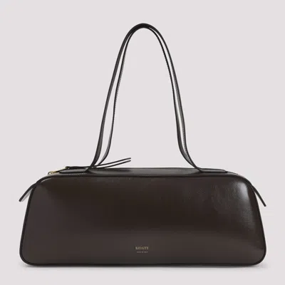 Khaite Simona Crackle Patent Elongated Tote Bag In Brown