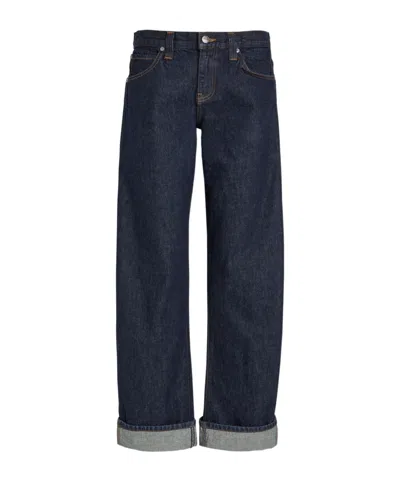Khaite Solid Color Turn-up Curved Jeans In Black