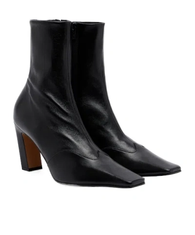 Khaite Solid-color Leather Ankle Boots In Black