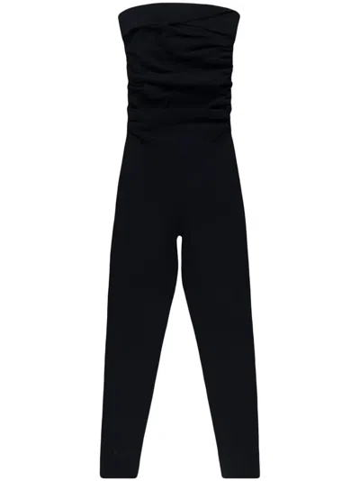Khaite Tela Strapless Ruched Stretch-knit Jumpsuit In Black