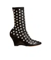 Khaite The Apollo Studded Wedge Boots In Black
