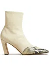 Khaite The Dallas Embossed Python-print Boots In Neutrals