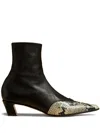 Khaite The Neveda Leather Boots In Black