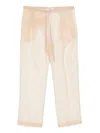 Khaite Trenton Pleated Silk-organza Tapered Pants In Neutrals