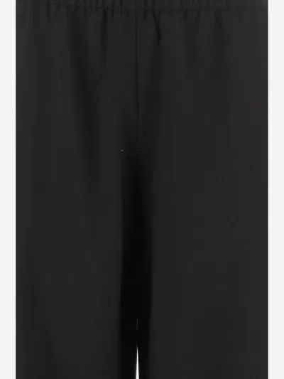 Khaite Virgin Wool Wide-leg Trousers In Black