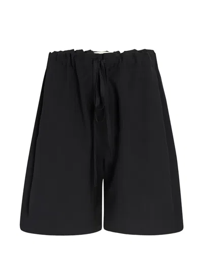 Khaite Virgin-wool Shorts In Black