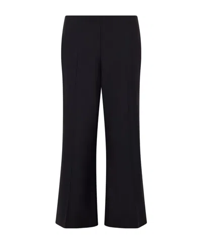 Khaite Walter Wool Mid-rise Flared Leg Pants In Black