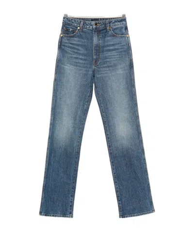 KHAITE WHISKERED DENIM TROUSERS