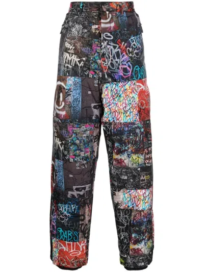 Khrisjoy All-over Graphic-print Trousers In Schwarz