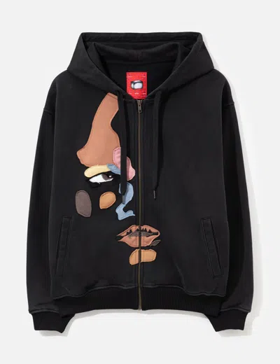 Kidsuper Side Eye Face Hoodie In Black