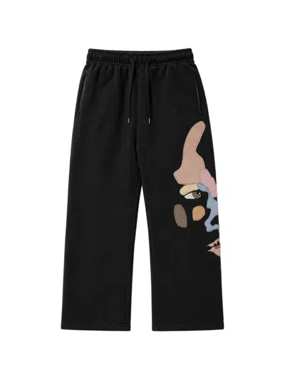 Kidsuper Side Eye Face Track Pants In Animal Print