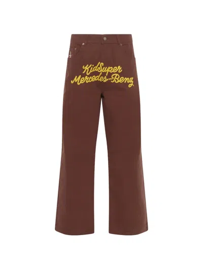 Kidsuper X Mercedes Benz Logo-embroidered Wide-leg Trousers In Brown