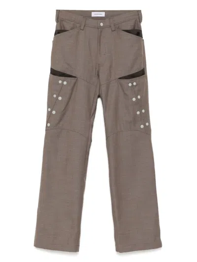 Kiko Kostadinov Inex Snap Trousers In Brown