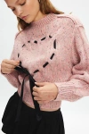 Kimchi Blue Elise Heart Ribbon Mockneck Pullover Sweater In Pink, Women's At Urban Outfitters In Pink