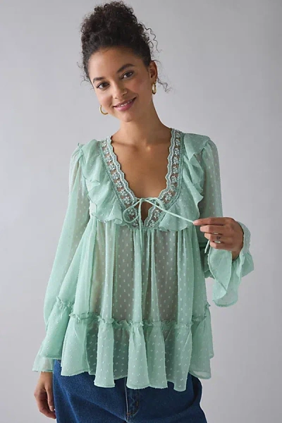 Kimchi Blue Mona Sheer Clip Dot Ruffle Babydoll Tunic Blouse In Green, Women's At Urban Outfitters In Animal Print