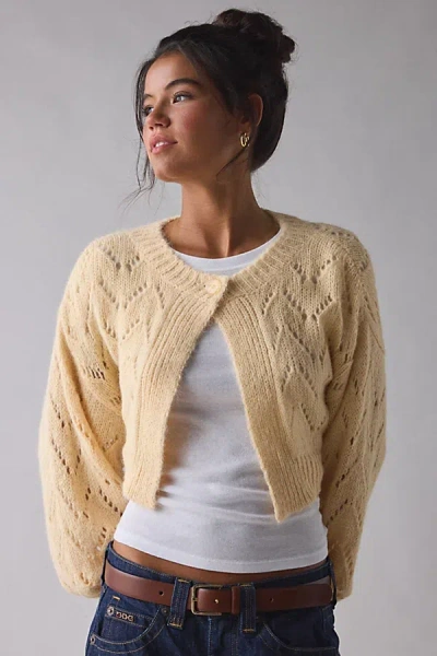 Kimchi Blue Pointelle Knit Tie-back Cropped Shrug Cardigan In Cream, Women's At Urban Outfitters In Neutral