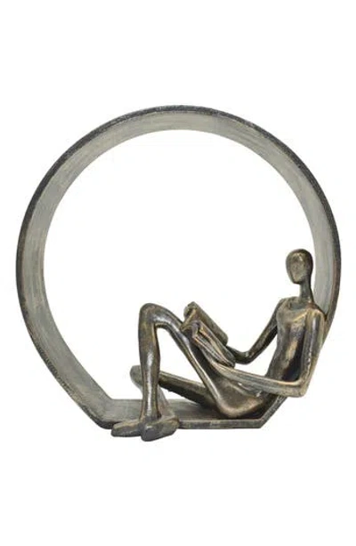 Kinetic Encircled Reader Sculpture In Metallic
