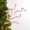 Kirkland's Candy Cane Stripe Swirls Tree Pick In Multi