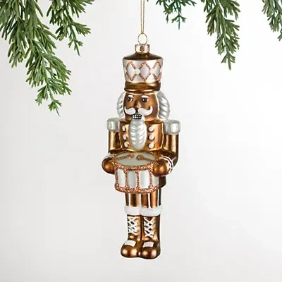 Kirkland's Jolly Nutcracker Glass Christmas Ornament In Brown