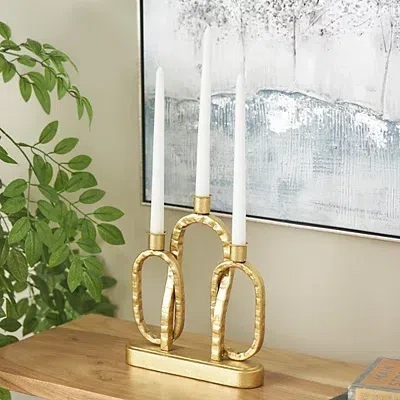 Kirkland's Metal Ovals Taper Candle Holder In Gold